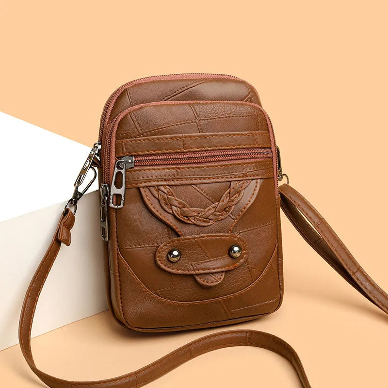 Soft PU retro mobile phone bag in vertical square shape with weaving and rivet details.