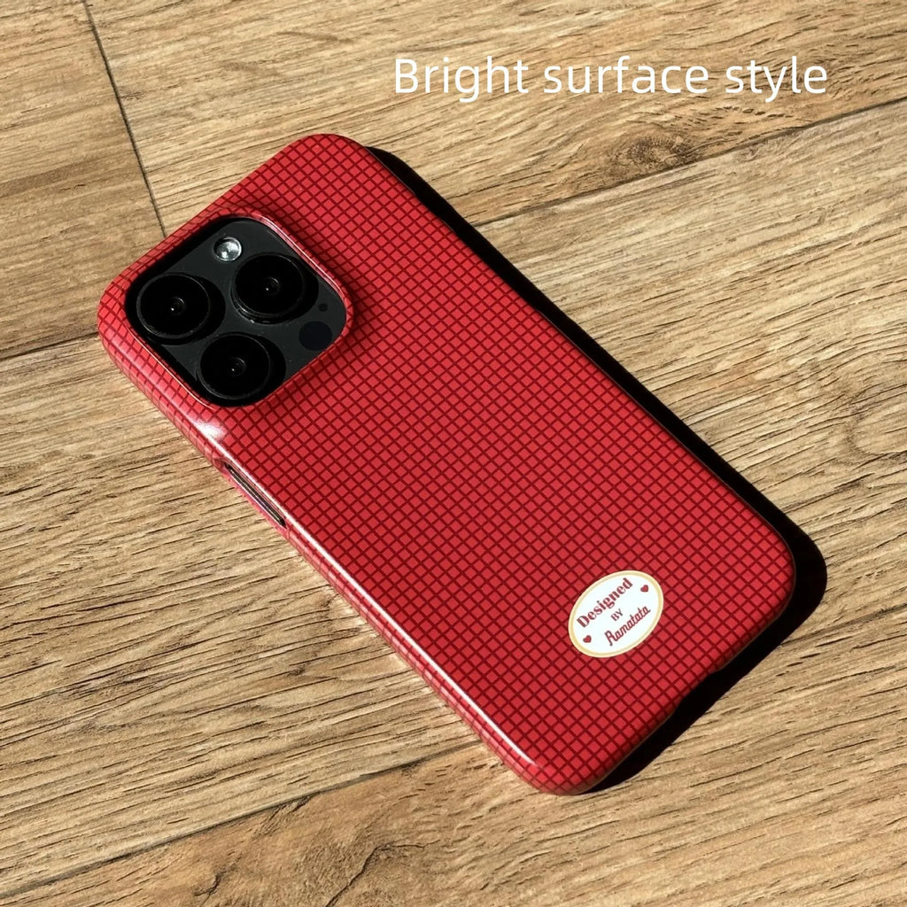 iPhone 15 Pro Max phone case with red plaid design and anti-fingerprint finish.