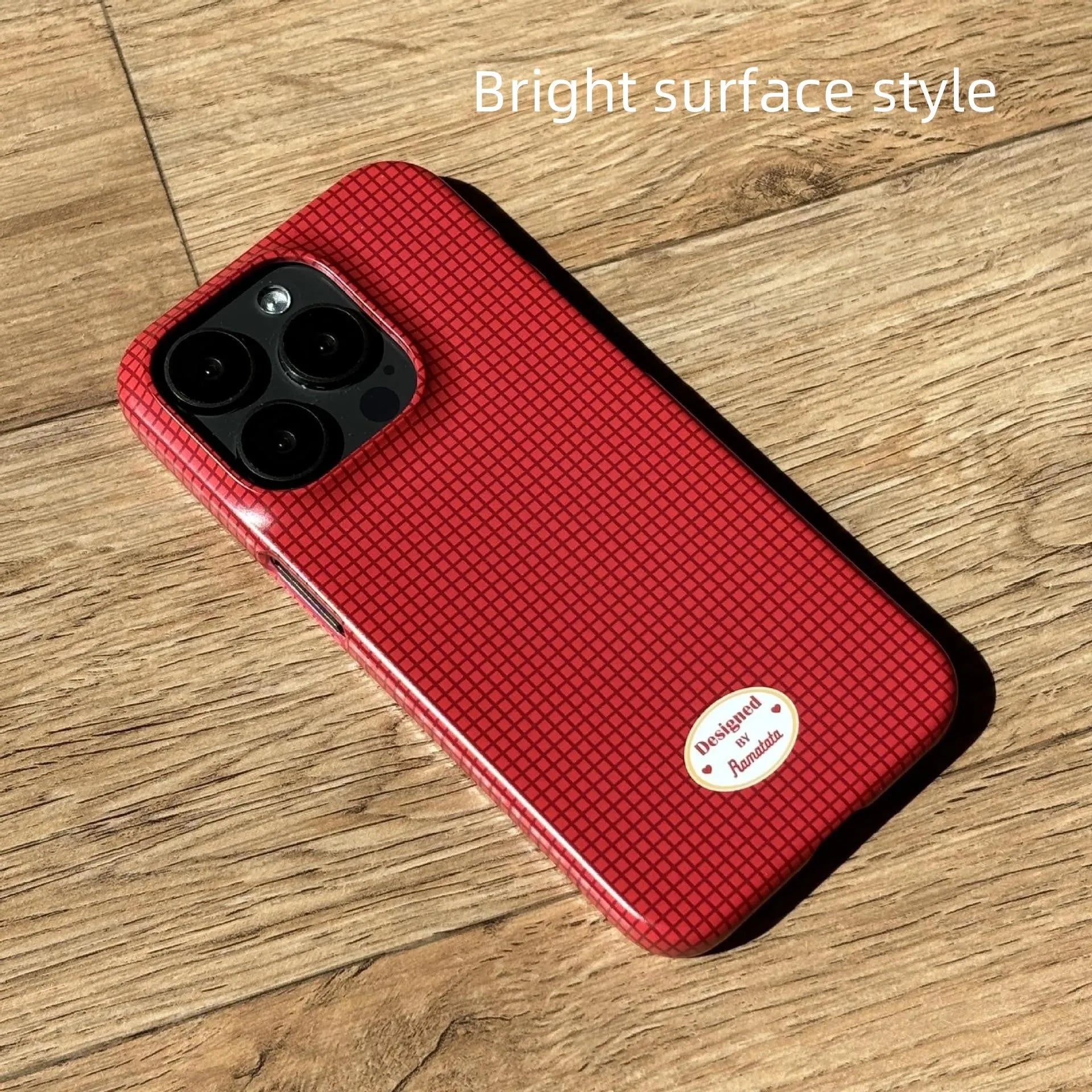 iPhone 15 Pro Max phone case with red plaid design and anti-fingerprint finish.