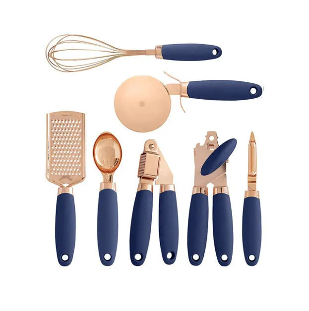 7-piece stainless steel kitchen tool set with copper plating in assorted colours on a countertop.