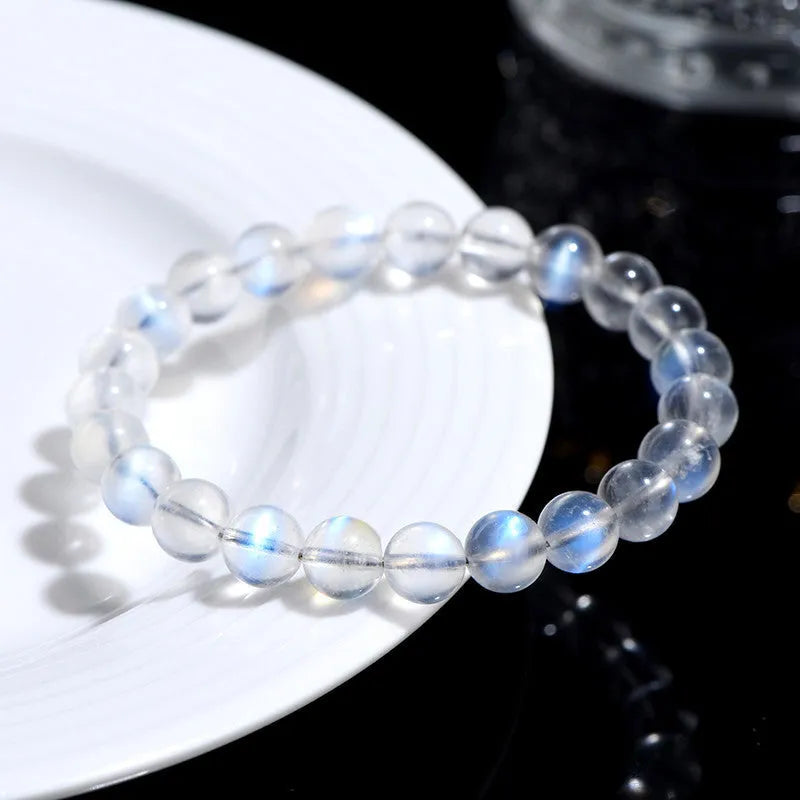 Natural cream body crystal bracelet on wrist showing smooth ground beads.