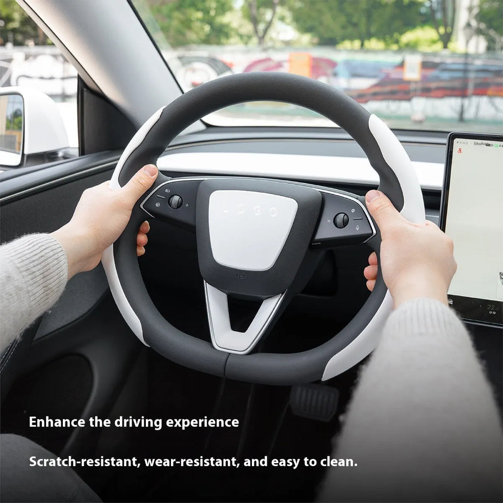 White steering wheel protective patch with decorative shell design on car steering wheel