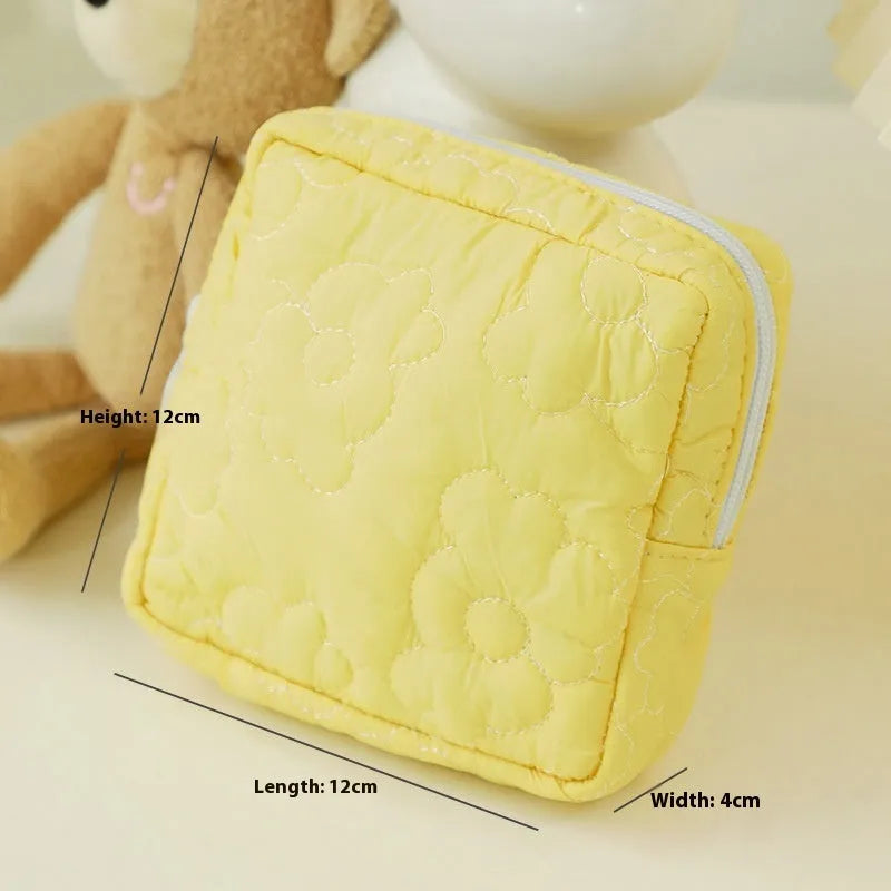 Quilted candy colour cosmetic storage bag for women with matching sanitary pad bags