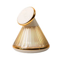 Night table lamp with wireless charging surface in champagne gold metallic finish