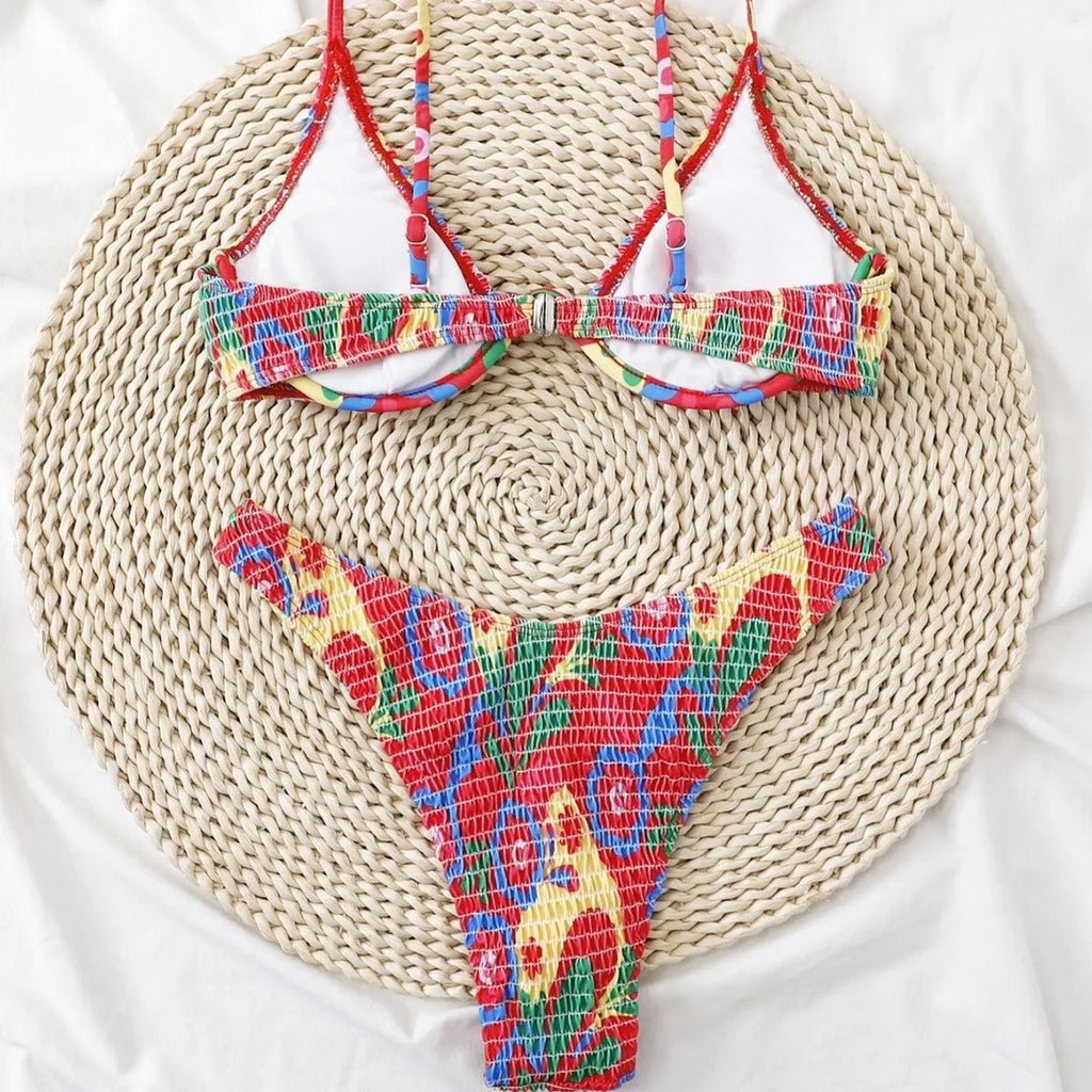 Red floral pattern women's underwire triangle bikini with briefs-style bottom on mannequin