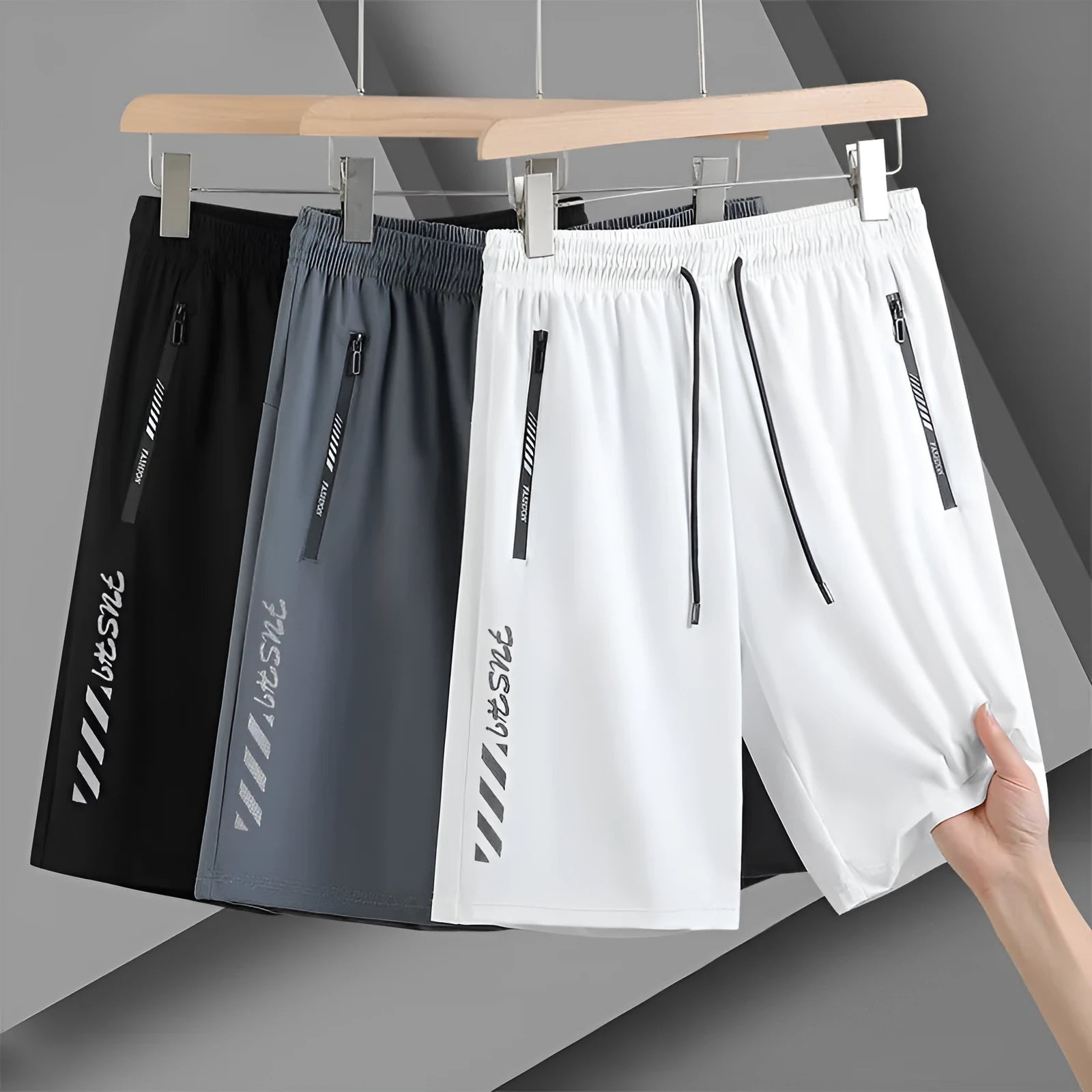 Men's quick-drying nylon sports shorts in loose fit with fifth pants length