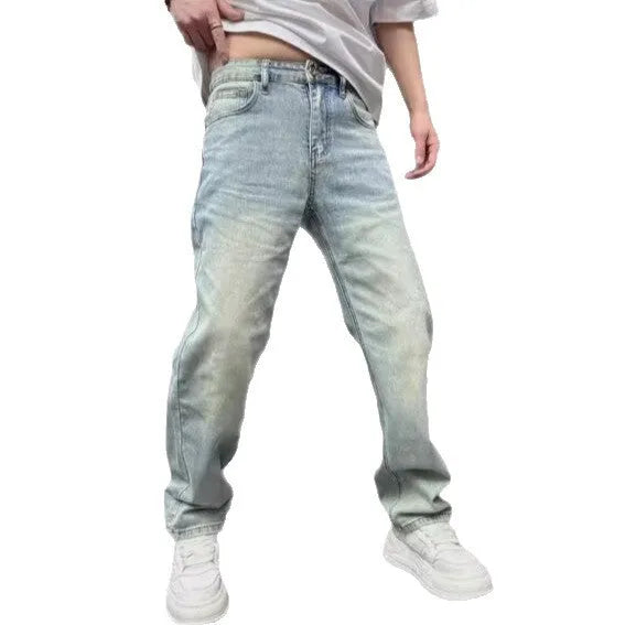 Light blue straight slim denim trousers for teenagers with mid-rise waist and zipper fly closure