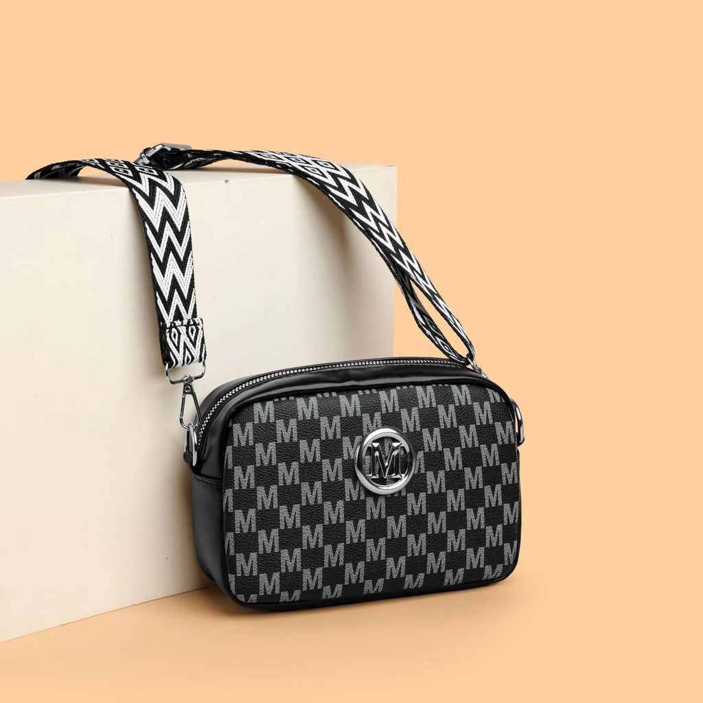 Women's synthetic leather crossbody bag with wide shoulder strap and three-dimensional front pocket