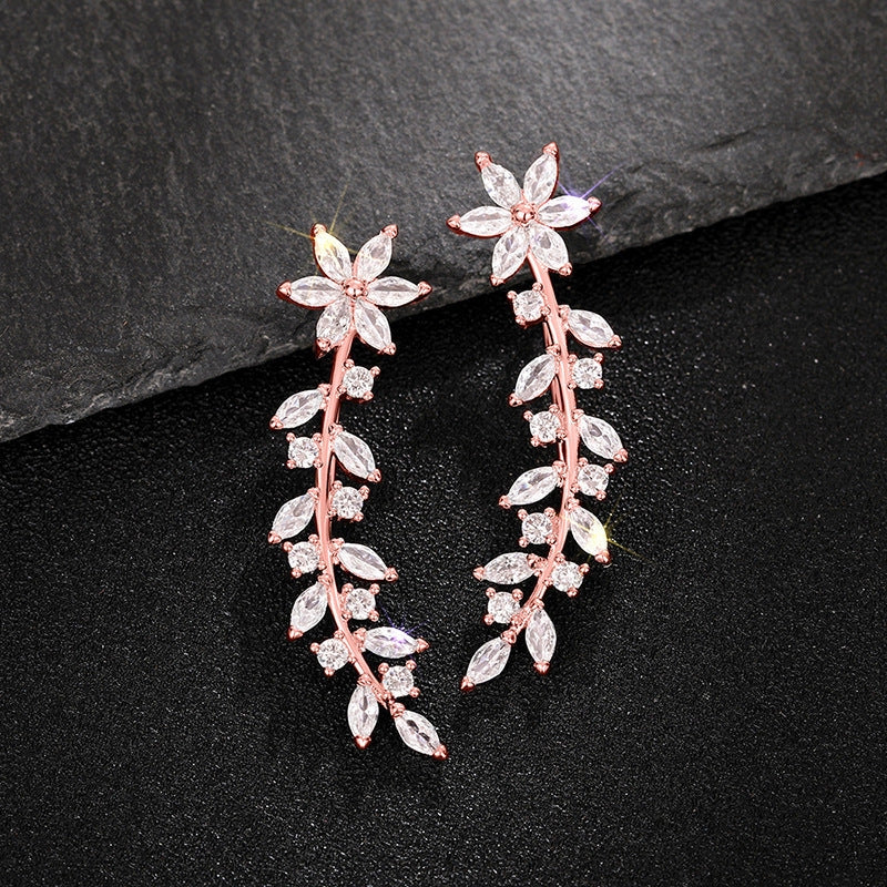 Floral diamond earrings for women in white gold, gold, and rose gold finishes