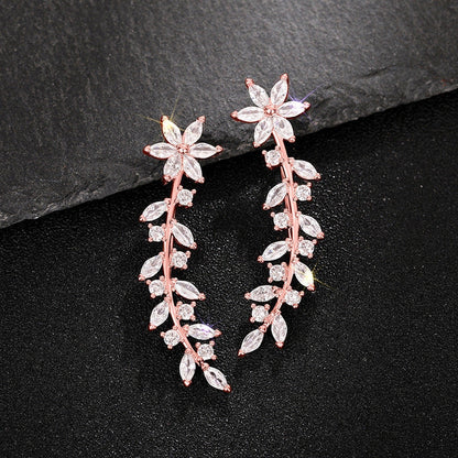 Floral diamond earrings for women in white gold, gold, and rose gold finishes