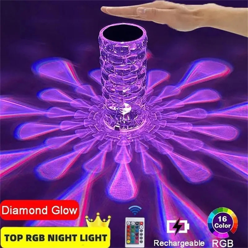 Crystal table lamp with teardrop acrylic shade showing droplet shadow effect on bedside table