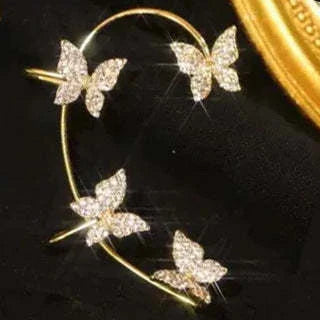 Stylish butterfly ear clips in gold and silver colors, featuring a delicate bow-tie design for fashionable women