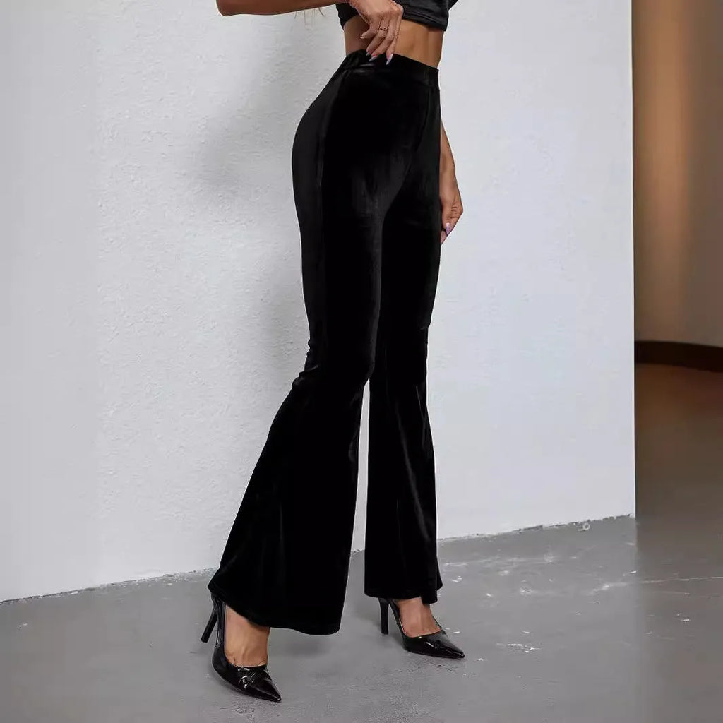 Black high-waist flared corduroy trousers for women with slim fit and slightly elastic fabric