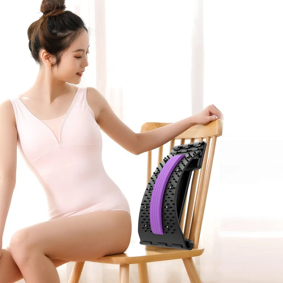 Adjustable back stretcher massager in trapezoid shape on a neutral background.