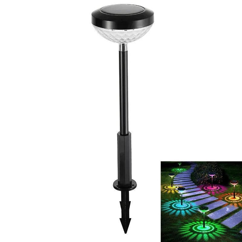 Outdoor solar lawn projection water droplet lights with RGB colour gradient and warm light modes, inserted in grass