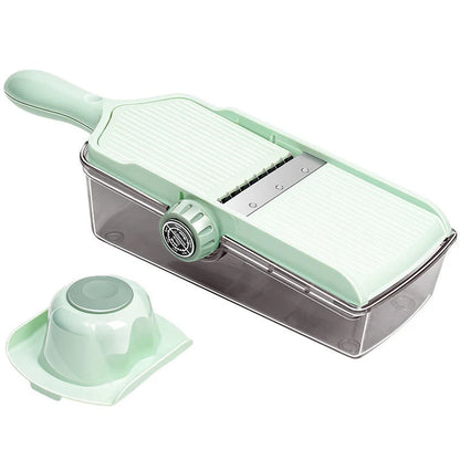 Adjustable vegetable slicer with stainless steel blade in mint green