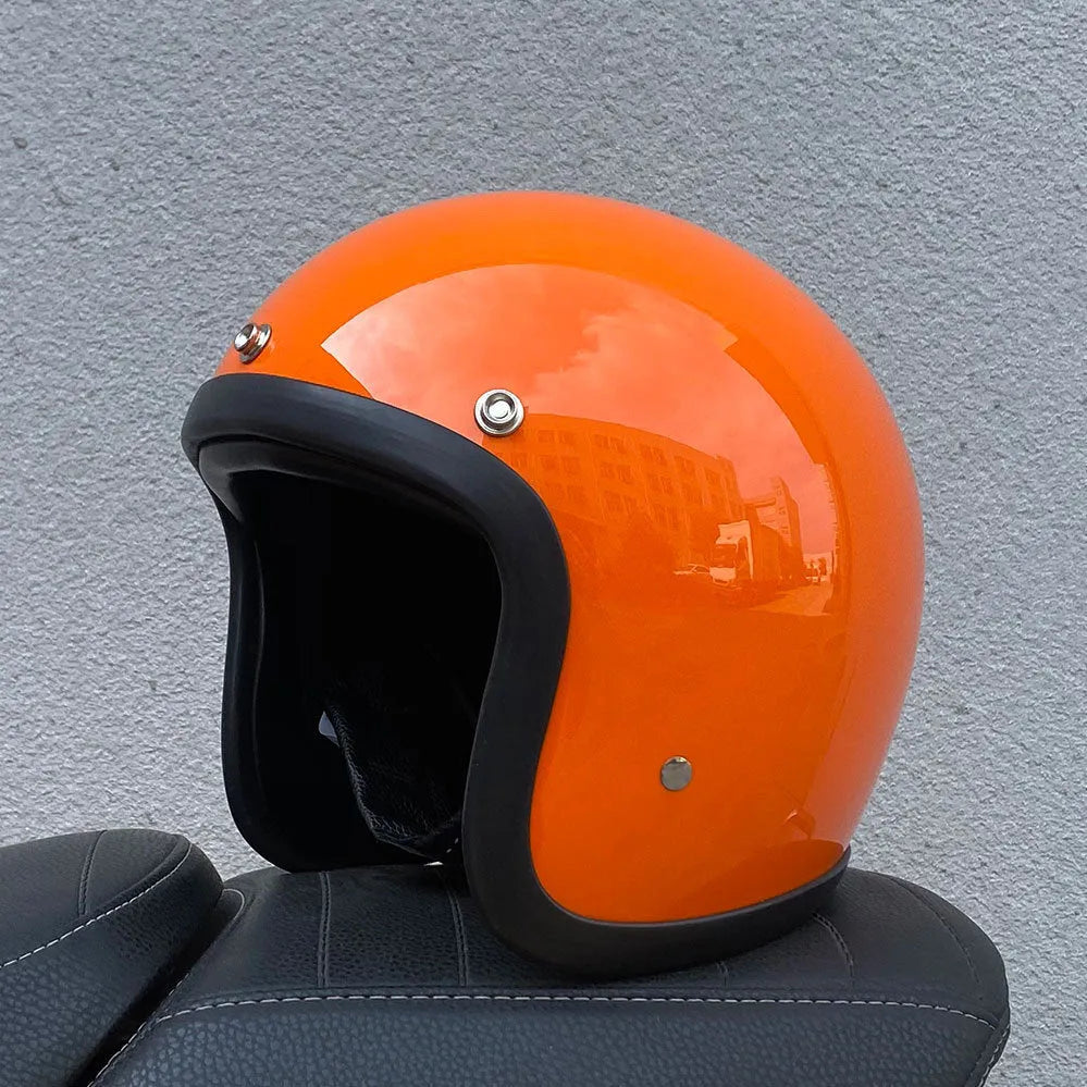 Glass fibre FRP retro half motorcycle helmet shown in a cement grey colour.