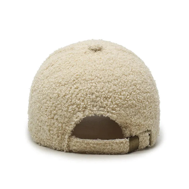 Adjustable lambskin-look winter baseball cap in dome crown style shown in multiple colours.