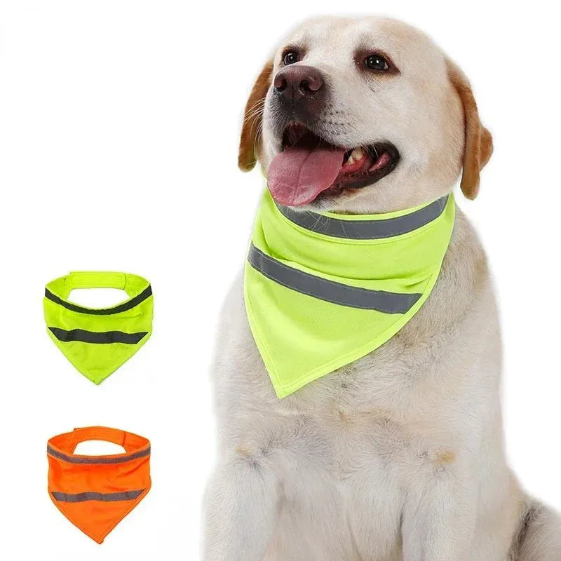 Yellow and orange reflective striped dog bandana with adhesive strap, shown on a dog's neck.