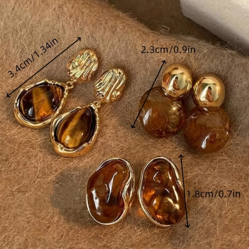 Handmade women's geometric tassel earrings in three colour styles: Maillard blooming, French irregular Amber, and water drop Tigereye