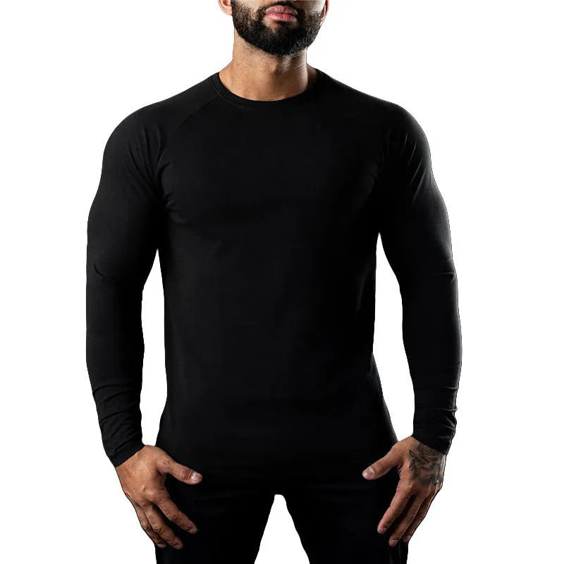 Men's long sleeve cotton sports t-shirt in tight fit with round neck, available in multiple colours