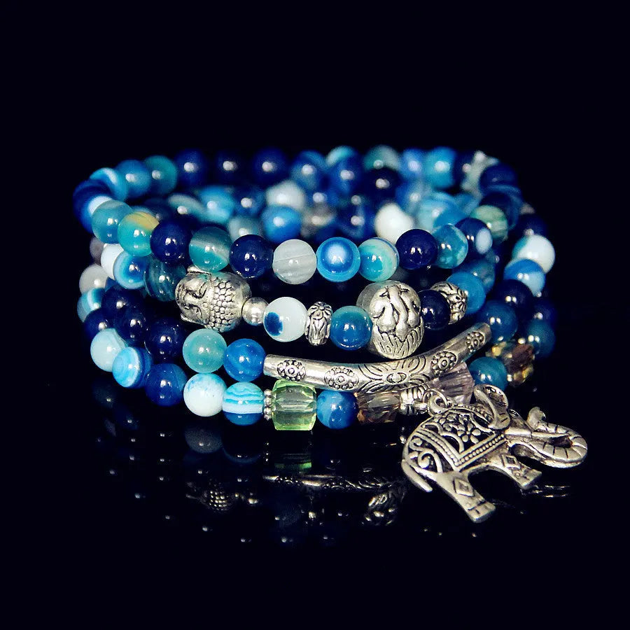 Multi-layer agate bracelet with 6mm beads showing blue elephant pattern on natural crystal stone