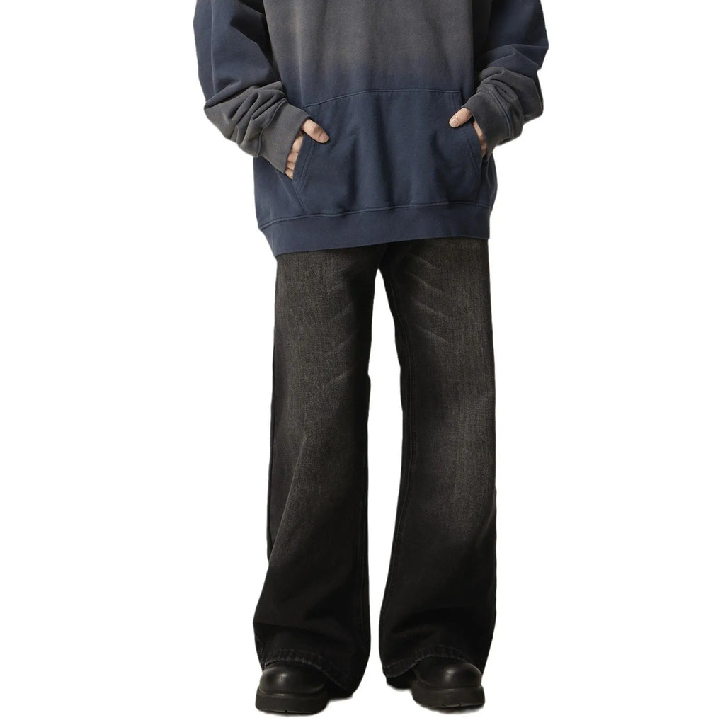 Black loose straight leg jeans with retro American styling and zipper fly