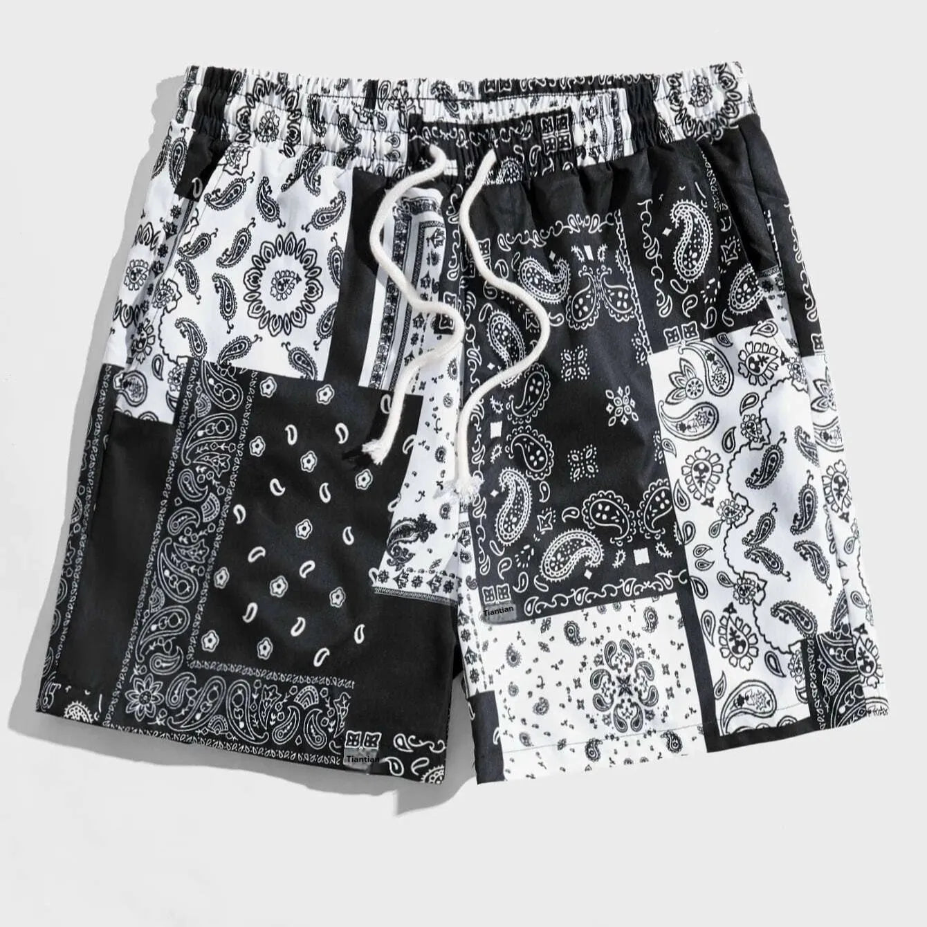 Men's thin polyester mesh beach shorts in various colours, showing simple printed design