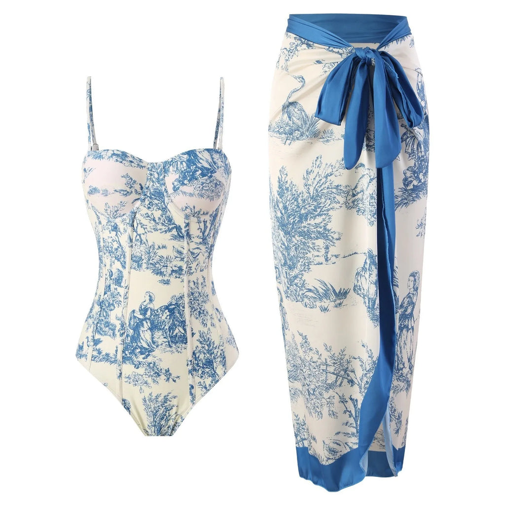 Blue women's one-piece polyester swimsuit with matching gauze skirt laid flat