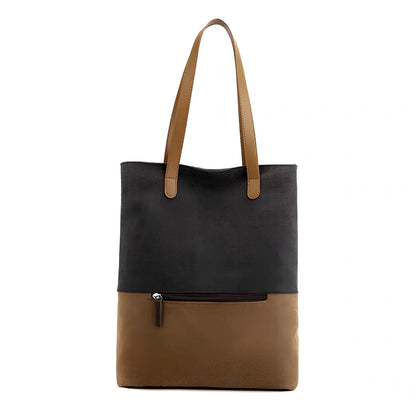 Canvas tote bag in black converts to backpack, 30x10x39cm size with zipper and polyester lining