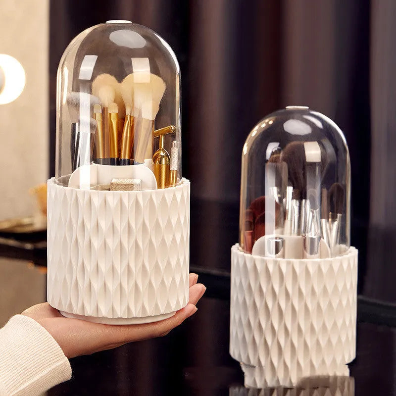 White rotating acrylic makeup brush holder with transparent dust cover showing brush compartments