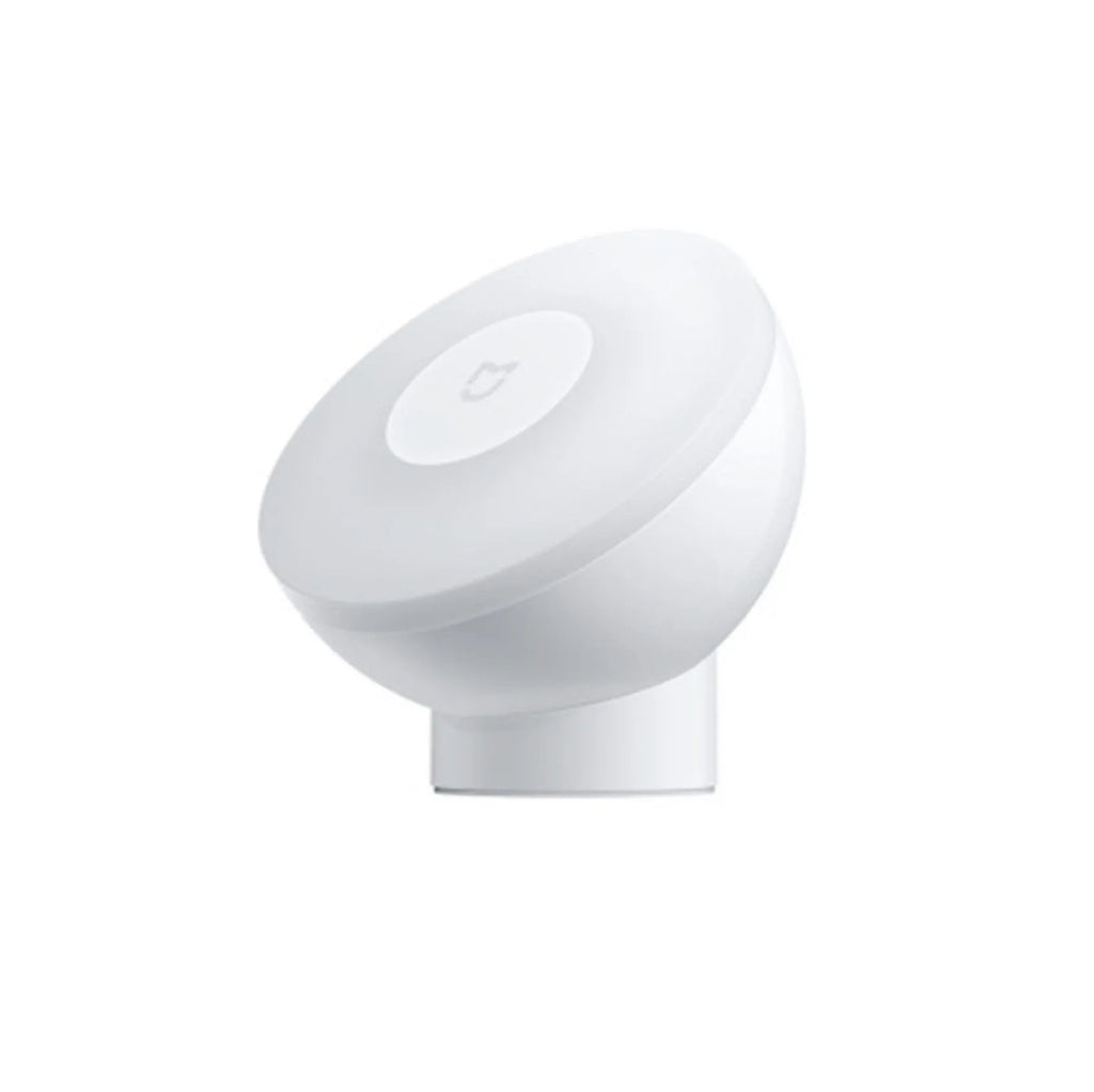 White modern bedside table lamp with human body induction and Bluetooth connectivity.