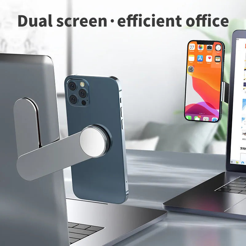 Silver aluminium alloy foldable magnetic dual screen extension bracket holding a mobile phone.