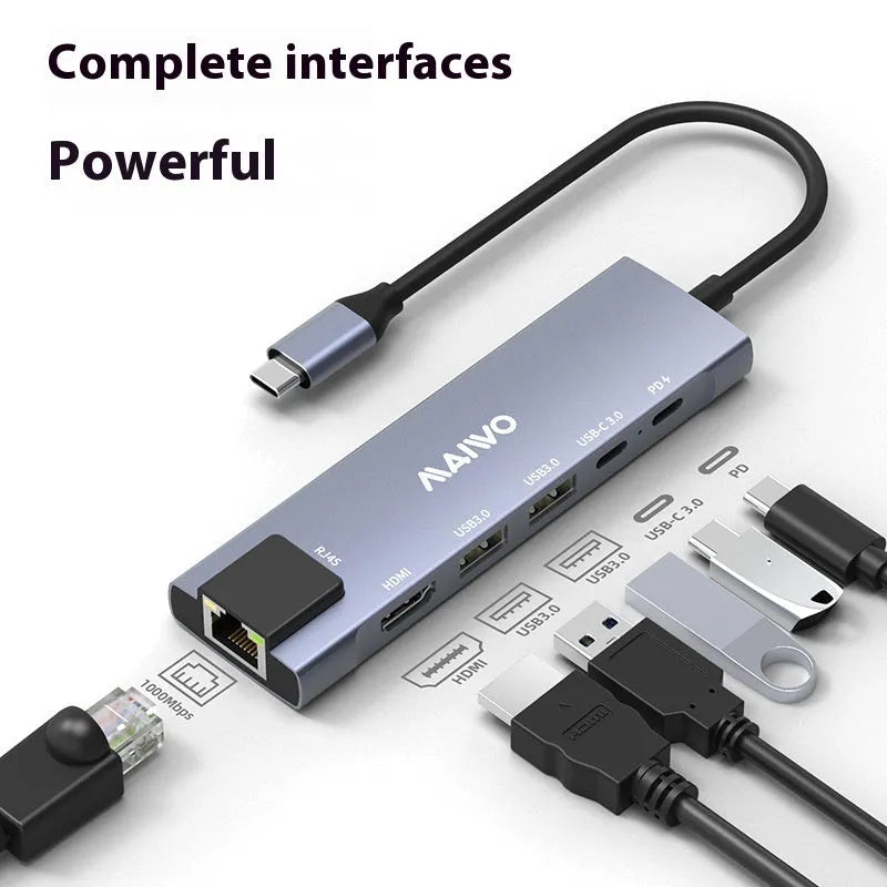 Aluminium alloy Steam Deck six-in-one docking station with USB-C cable and labelled ports for HDMI, Ethernet, and USB.