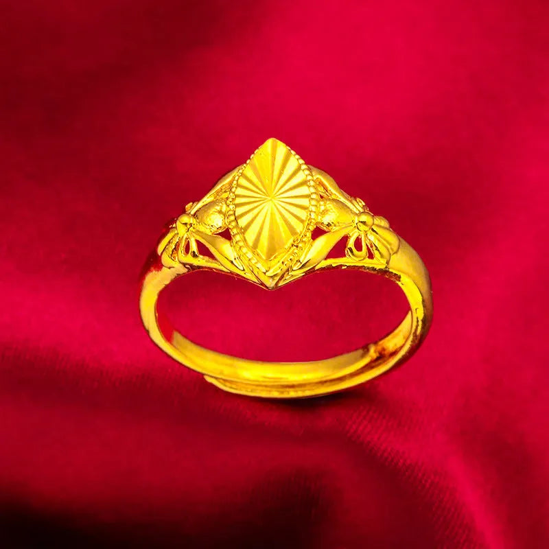Open diamond flower ring in gold colour with geometric shape and textured details