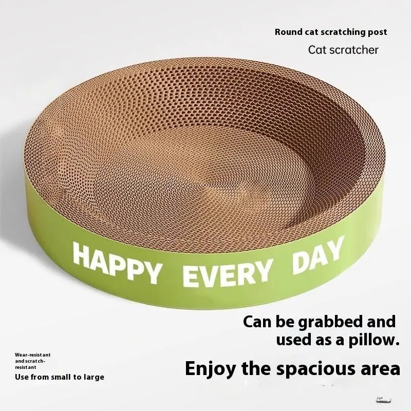 Round green cat nest with integrated scratching board measuring 50cm across