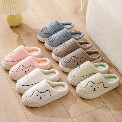 Cozy cat-themed slippers with plush uppers and non-slip rubber soles, available in a variety of vibrant colors