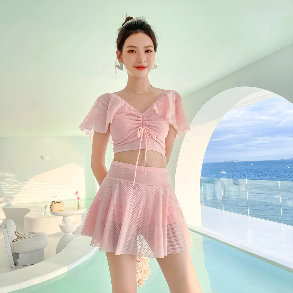Women's two-piece skirt swimsuit in solid colour with separate top and skirt components