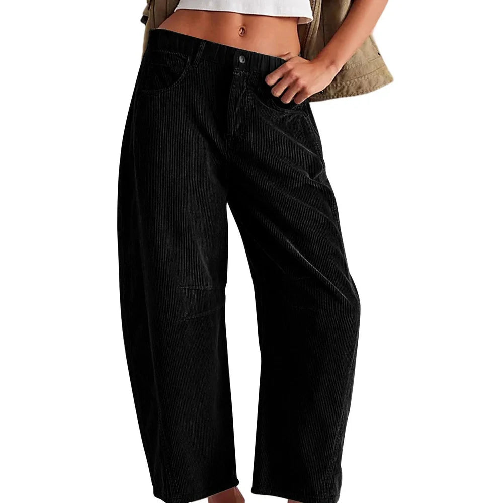 Women's straight-leg corduroy trousers in dark green with loose fit through hips and thighs