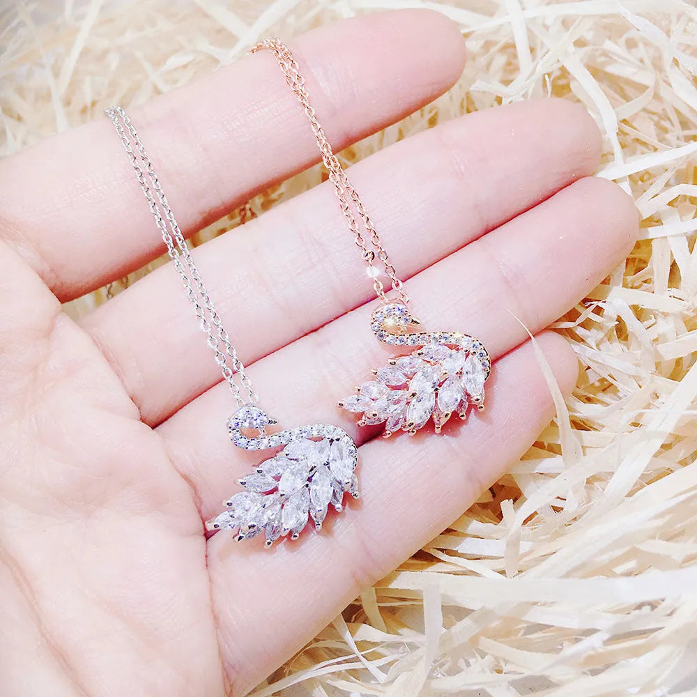 Alloy swan pendant necklace on snake bones chain, adjustable 51-80cm, available in nine colour options including silver and rose gold