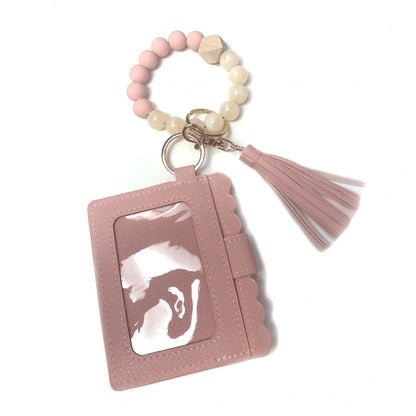 Beaded card bag set with wool ball, 130dB alarm, spray, key knife, and bottle opener components