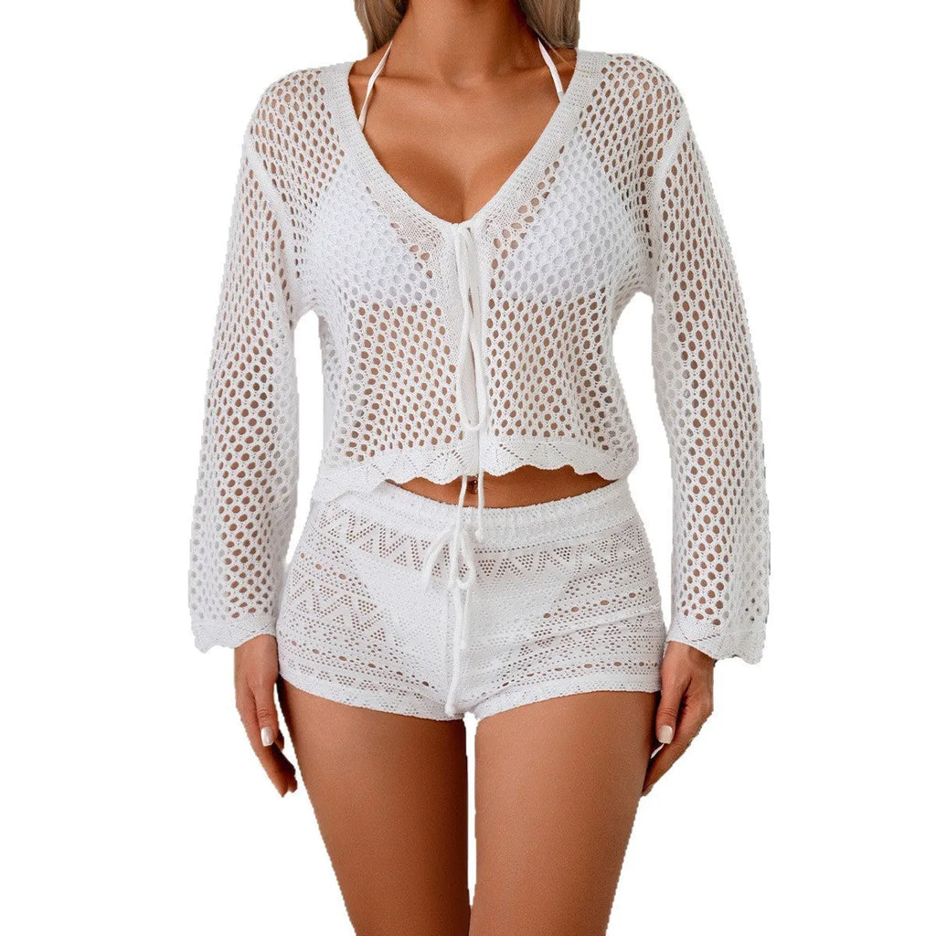 Short apricot-coloured women's cardigan blouse with bell sleeves, showing hollow woven texture.