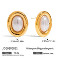 A pair of stainless steel vintage pearl ball stud earrings with surgical steel posts on a white background.