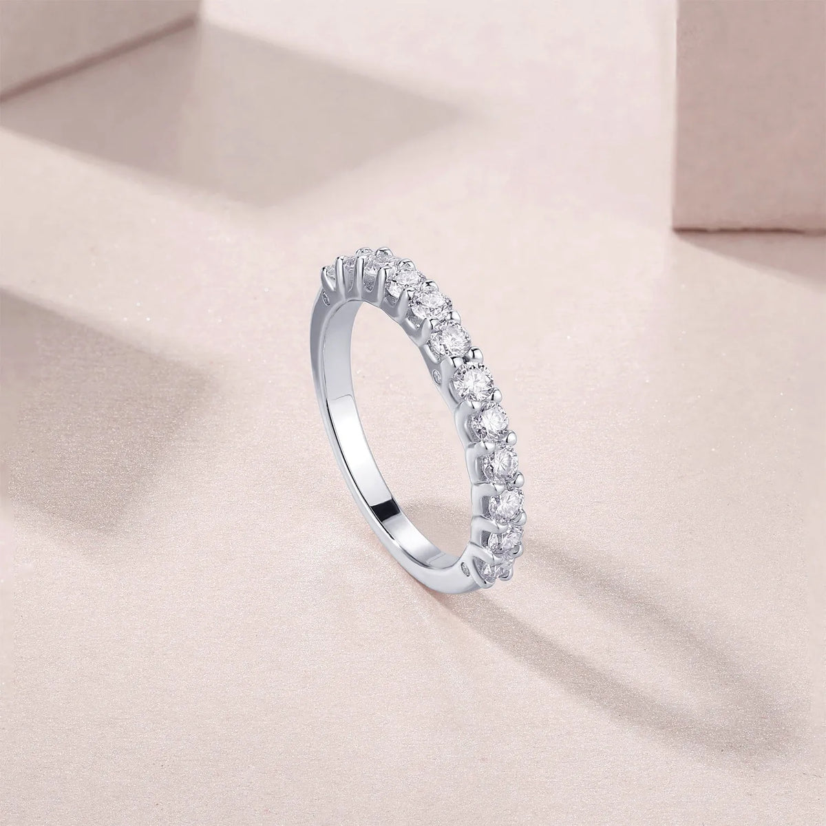 The Radiance moissanite wedding ring in S925 silver with platinum plating, on a white background, with GRA certificate and gift box