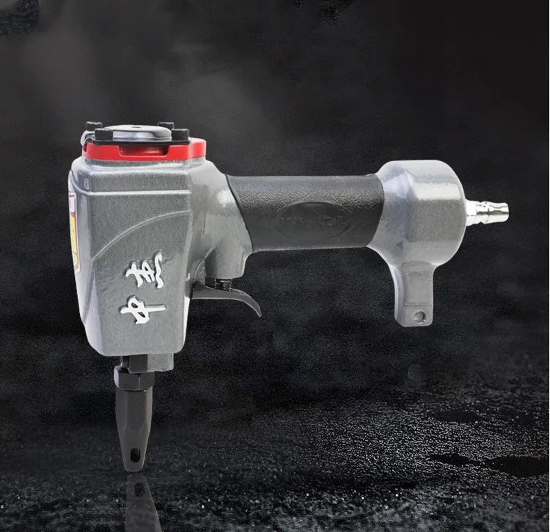DK30 model metal pneumatic nail gun for punching holes in fabric and sheet materials.
