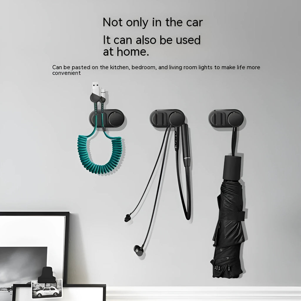 ABS silicone car and indoor cable storage hook in dark green measuring 52mm x 27mm