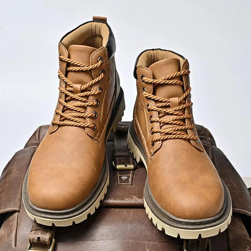 Genuine leather men's mid-top Martin boots in brown with stitched rubber sole and mesh fabric panels