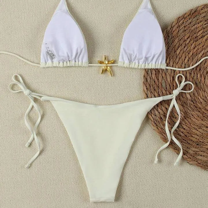 XINGX women's lace-up bikini swimsuit in creamy-white with nylon fabric and brief bottom for beach or hot spring use