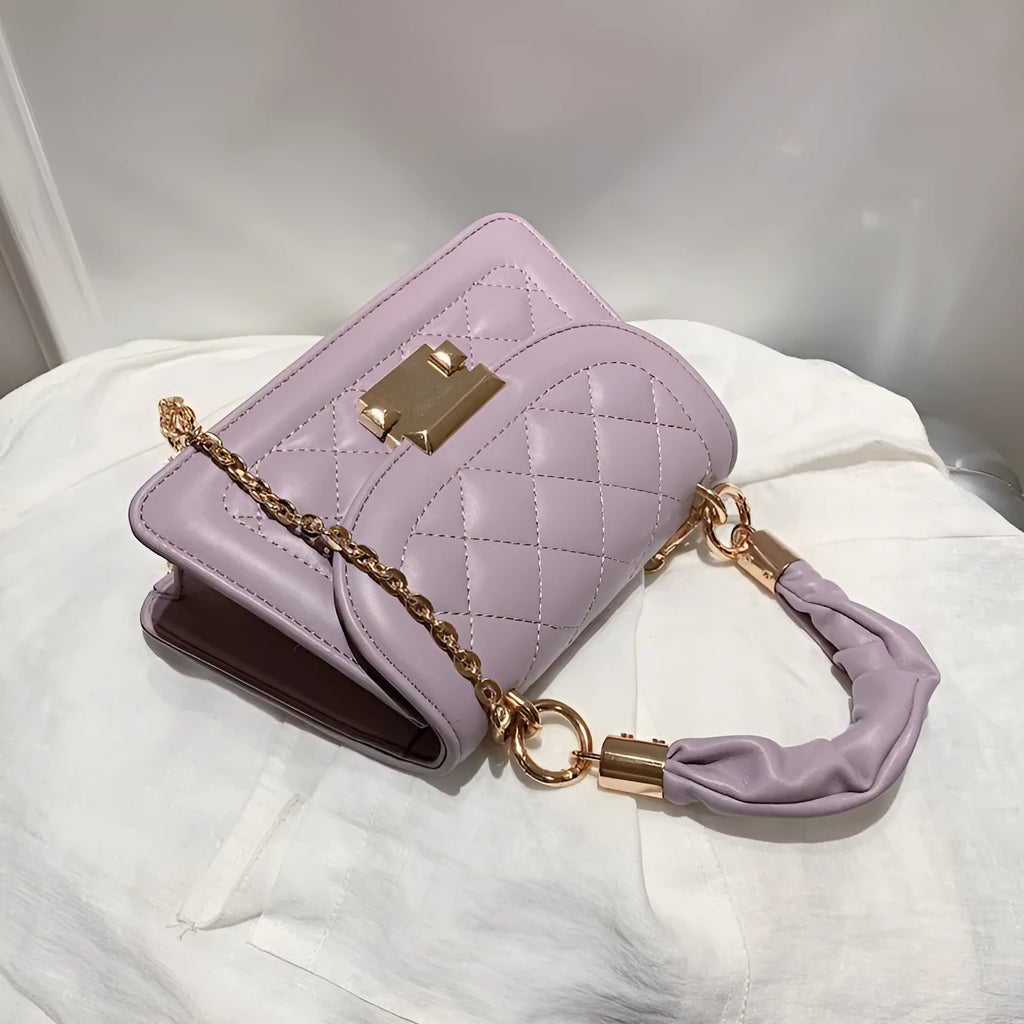 Women's purple rhombus square shoulder bag with crossbody strap showing structured design