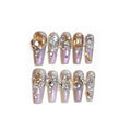False nail patches with luxury rhinestone designs and phototherapy sealing layer on card packaging